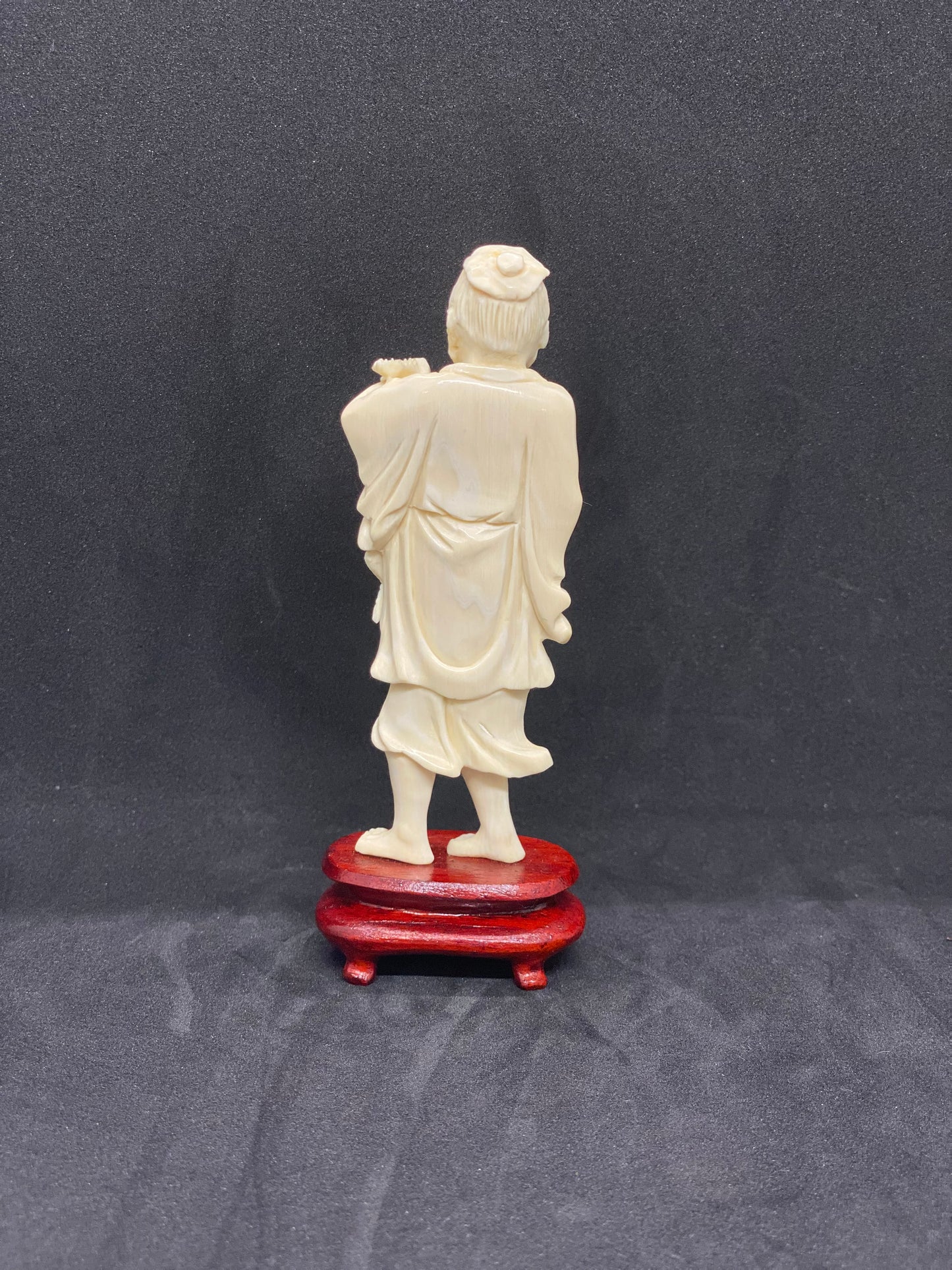 Antique Ivory Fisherman holding fish