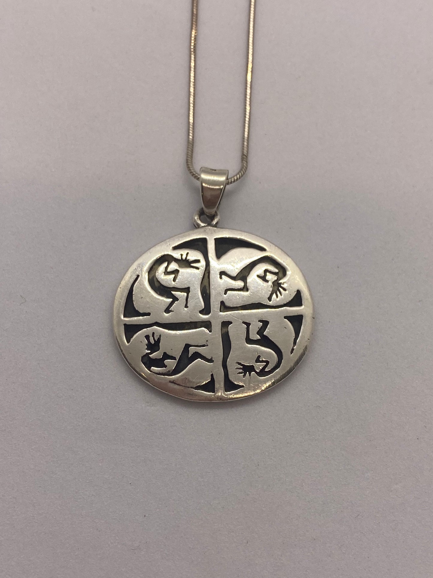 Sterling Silver Pendant and Chain with Southwestern inspired Motifs